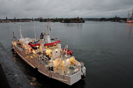 Sweden. Stockholm. Stockholm coast early in the morning. Lights of the morning city. September 17,...