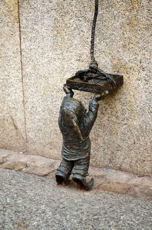 Poland. Wroclaw. Bronze statuette of the gnome in Wroclaw. February 20, 2018のeditorial素材