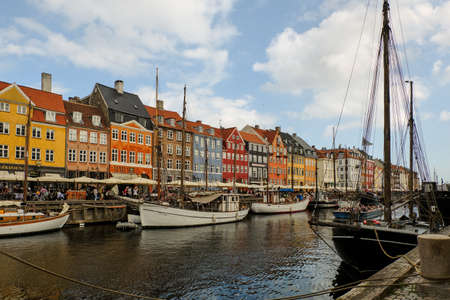 September 19, 2018 Denmark. Copenhagen. Colorful embankment Nyhavn. Bright houses and ships.のeditorial素材