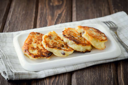 Homemade cottage cheese pancakes with raisinの写真素材