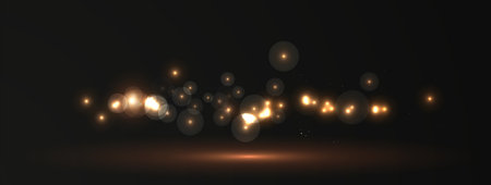 Golden dust light. Bokeh lights effect background. Christmas glowing dustのイラスト素材