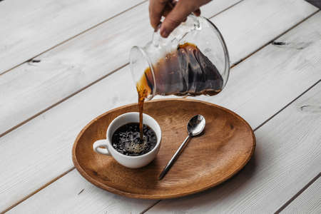 Americano espresso coffee on a wood tray. coffee americano espresso wooden.の写真素材