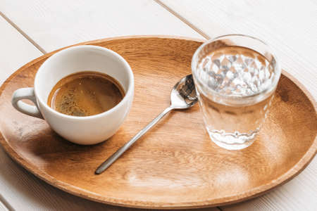 Americano espresso coffee on a wood tray. coffee americano espresso wooden.の写真素材