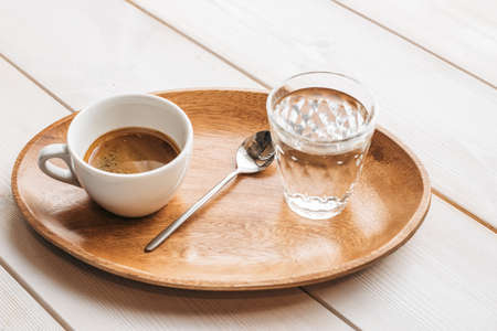 Americano espresso coffee on a wood tray. coffee americano espresso wooden.の写真素材