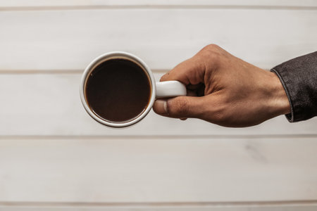 Espresso coffee americano on wooden background in cup. Espresso Americano in a glass of coffee.の写真素材