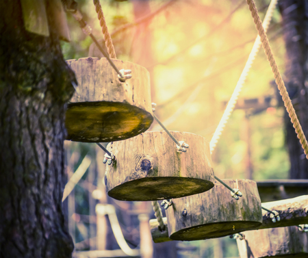 Rope road of logs in climbing forestの写真素材