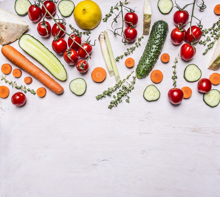 border  Various fresh fruits and vegetables herbs seasoning vegetarian food on wooden rustic background top view place for textの写真素材