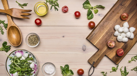 Superfoods and health or detox diet food concept Preparation of salad from various fresh ingredients lined with a frame, space for textの写真素材