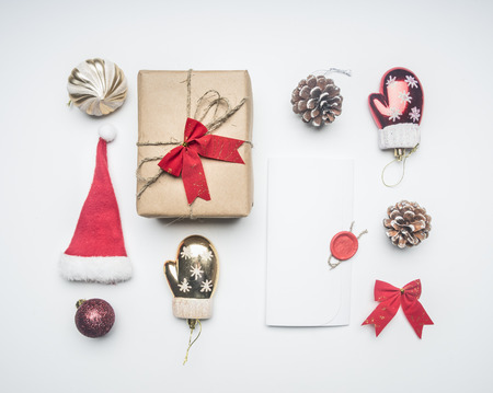 Christmas flat lay gift, Santa Claus hat, envelope and toysの写真素材