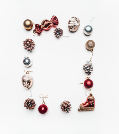 Christmas concept, Christmas toys lined frame on a white background, space for textの写真素材