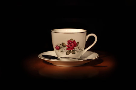 White coffe cup whith a spoon on a dark backgroundの写真素材