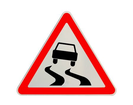 Road sign  slippery road  isolated on white backgroundの写真素材