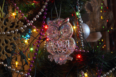Christmas tree decorations - transparent plastic owl photoの写真素材