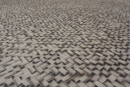 A brown glazed tile on a pavement photoの写真素材