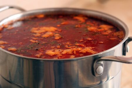 A stainless steel pan of borsch photo