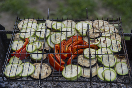 Pickled vegetables grilled over charcoal on the grillの写真素材
