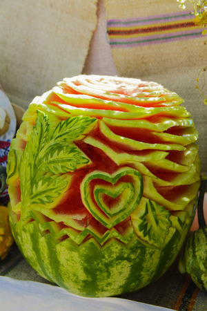 Skilled handicrafts. Fruits and vegetables at the fairの写真素材