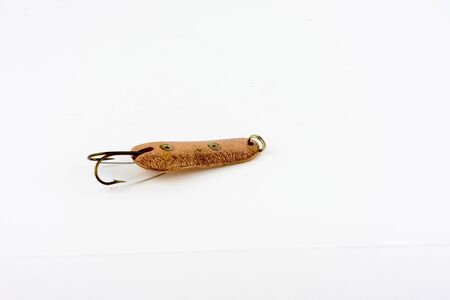 Exhibition of pirated copies of fishing metal spoon baits. Bait for fishing in the shape of a spoon...
