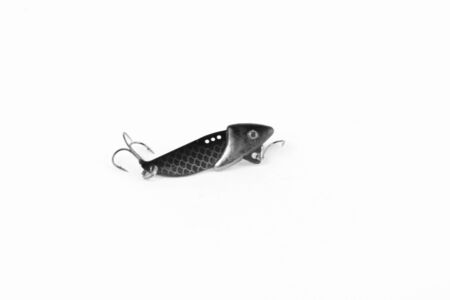 Exhibition of pirated copies of fishing metal spoon baits. Bait for fishing in the shape of a spoon...