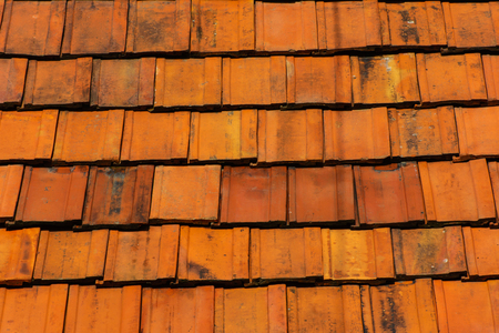 clean roof tiles background texture in regular rowsの写真素材
