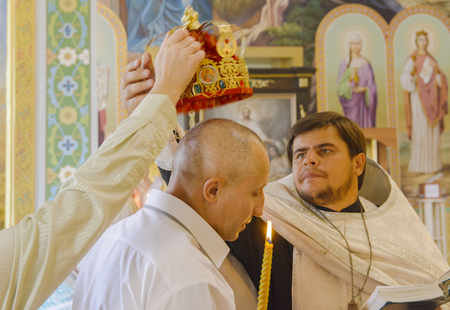 Church wedding of a married couple on October 2, 2016 in the Orthodox Church of Zhytomyrのeditorial素材