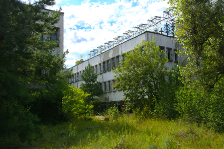 Destroyed buildings in the exclusion zone. Dead military unit. Consequences of the Chernobyl nuclear disaster, August 2017.のeditorial素材