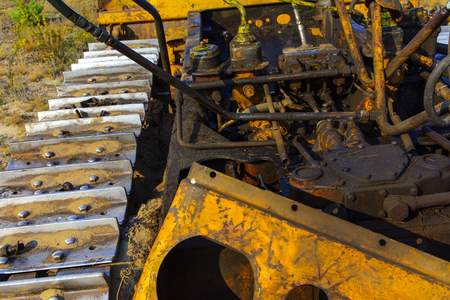 A rusted and abandoned rusty tractor. Dead radioactive zone. Consequences of the Chernobyl nuclear disaster, August 2017.の写真素材