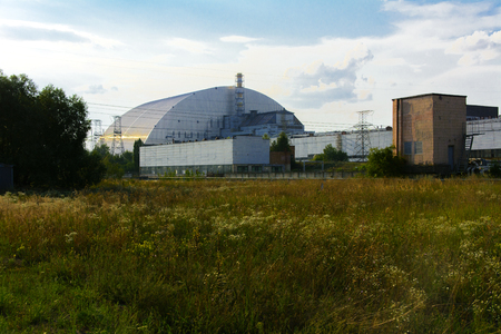 A new sarcophagus after the explosion at the fourth block of the Chernobyl nuclear power plant. Dead radioactive zone. Consequences of the Chernobyl nuclear disaster, August 2017のeditorial素材