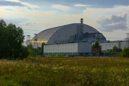 A new sarcophagus after the explosion at the fourth block of the Chernobyl nuclear power plant. Dead radioactive zone. Consequences of the Chernobyl nuclear disaster, August 2017のeditorial素材