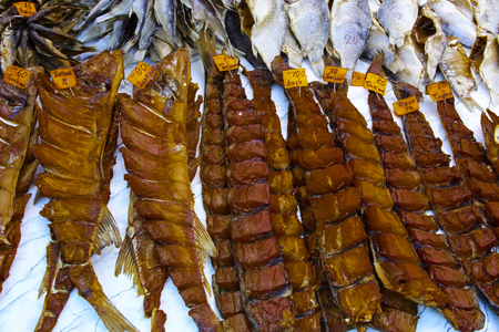 Street trading of smoked fish at the holiday. Day of the city. Zhitomir of 1133 year. September 2017, Ukraine.の写真素材