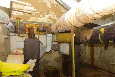 Old air handling unit. The abandoned and ruined storage room for vegetables. It was built in the times of the USSR.の写真素材