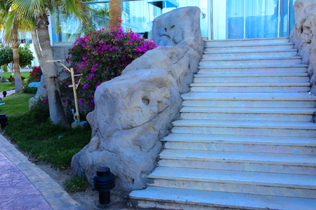 Sharm el-Sheikh, Egypt - March 14, 2018. The courtyards of a magnificent white hotel on a summer day. The concept of tourism, vacations and luxury recreation. Accommodation in Cyrene Grand Hotelのeditorial素材