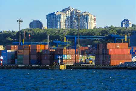 Odessa, Ukraine - August 08, 2018. Magnificent view from the sea on the coastal strip of the city before the sunset in soft light. High-rise buildings and commercial facilities on the shoreのeditorial素材