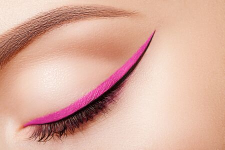 Colorful eye makeup closeup.の写真素材