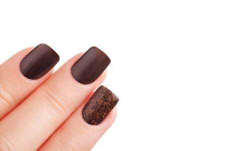 Very beautiful brown fingernails closeup.の写真素材