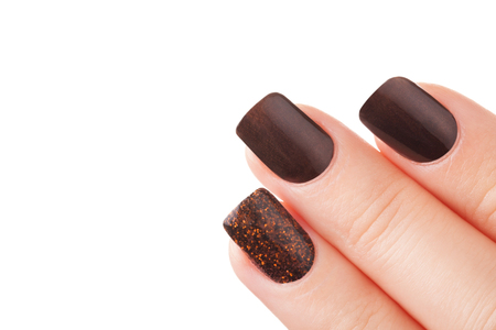 Very beautiful brown fingernails closeup.の写真素材