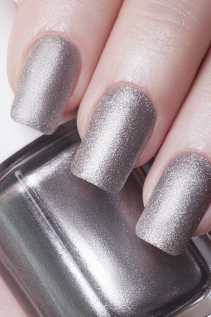Very beautiful silver metallic nails closeup.の写真素材