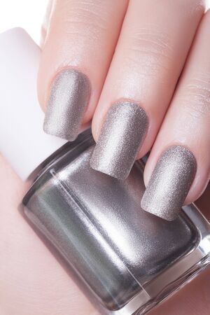 Very beautiful silver metallic nails closeup.の写真素材
