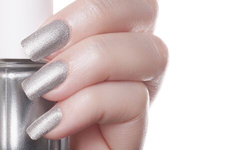 Very beautiful silver metallic nails closeup.の写真素材