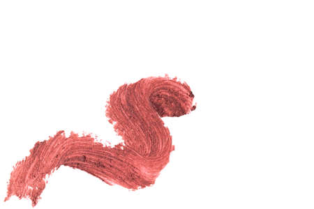 Brown lipstick on a white background close-up.の写真素材