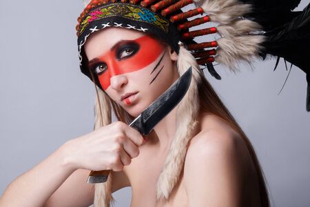 Beautiful girl in a military headdress.の写真素材