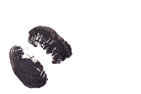 Black lipstick to natural lips close-up.の写真素材