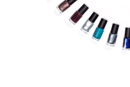 Many nail polish on a white background.の写真素材