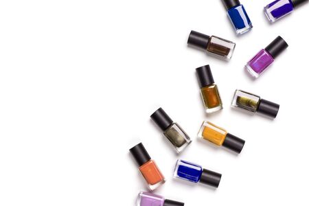 Many nail polish on a white background.