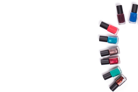 Many nail polish on a white background.の写真素材