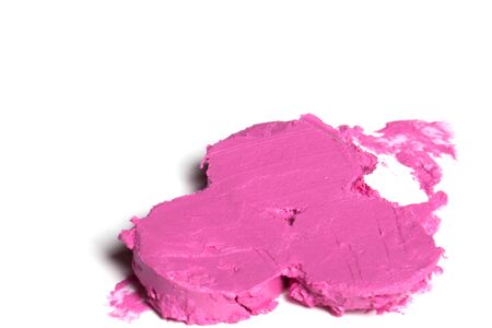 Pink lipstick on a white background close-up.の写真素材