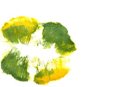 Yellowish green lipstick on natural closeup.
