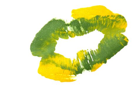 Yellowish green lipstick on natural closeup.