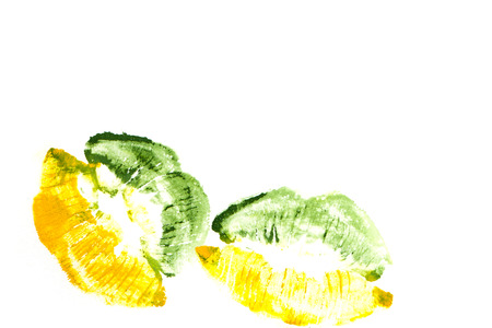 Yellowish green lipstick on natural closeup.の写真素材