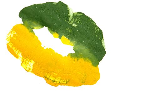 Yellowish green lipstick on natural closeup.の写真素材